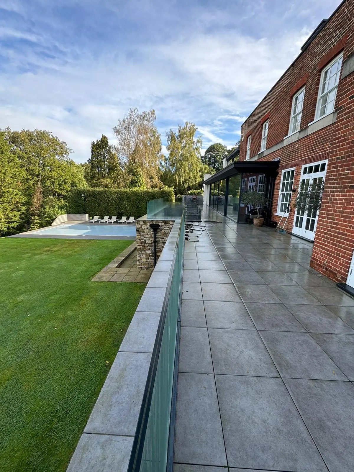 Diamond Gutters UK patio cleaning service with pressure washing